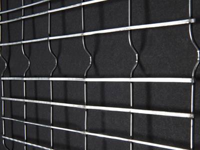 A part map of self-furring welded wire lath with black backing on the bottom.
